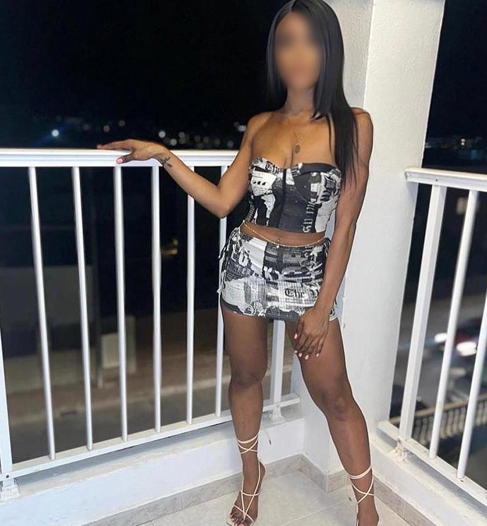 Birmingham escort in a black and white skirt and top