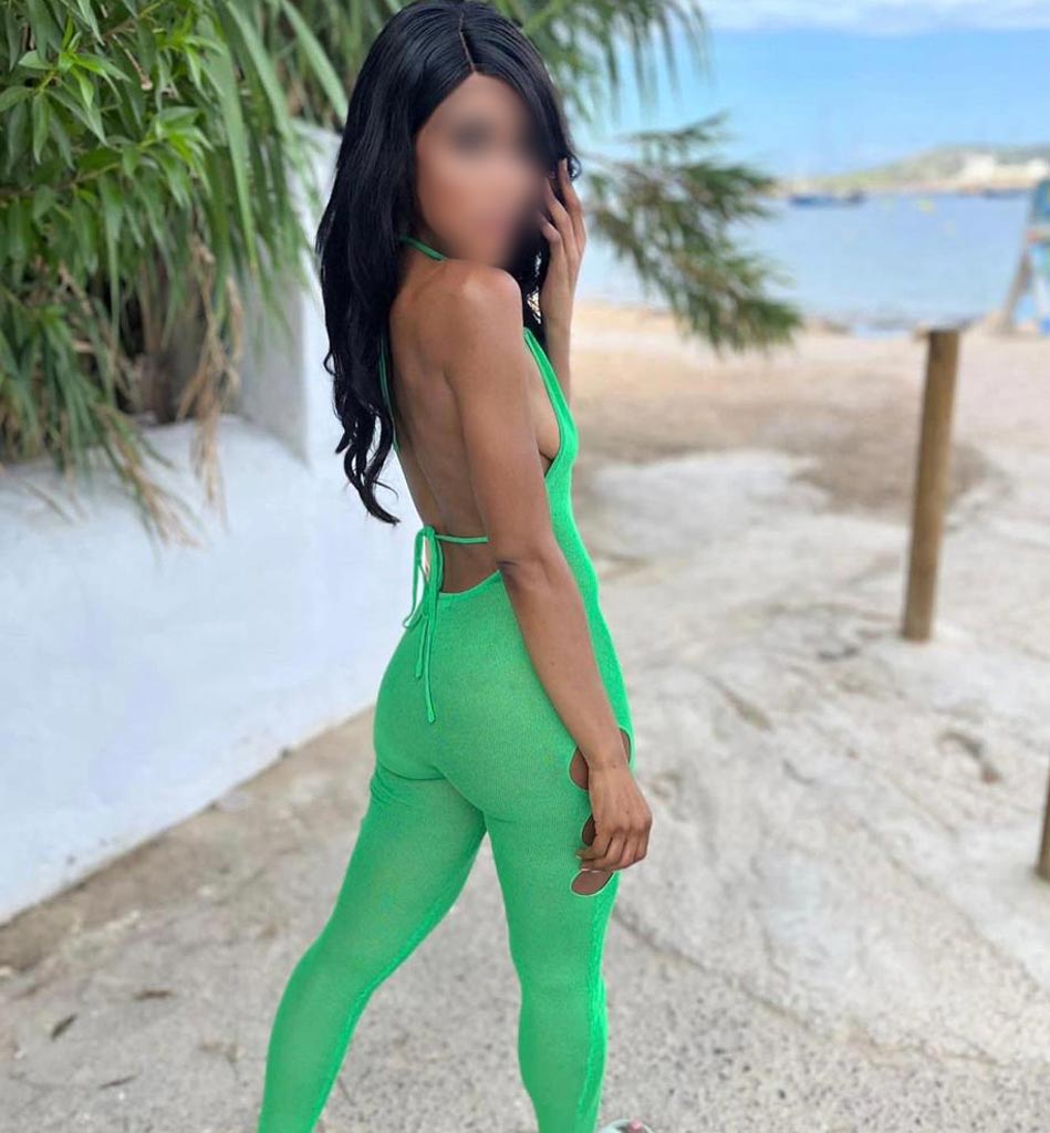 Birmingham escort in a green jumpsuit